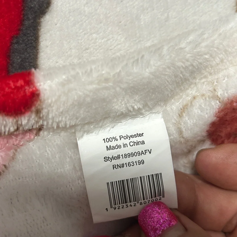 Festive Holiday Blanket with Red and Green Accents used one’s